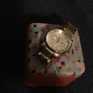 Gold women's Fossil watch